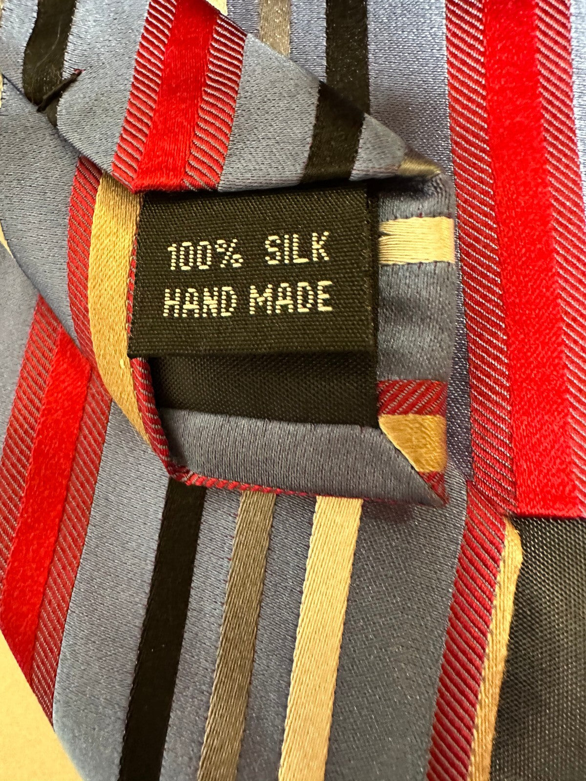 XMI 325 Series multicolored diagonal regimental striped 100% silk tie hand made
