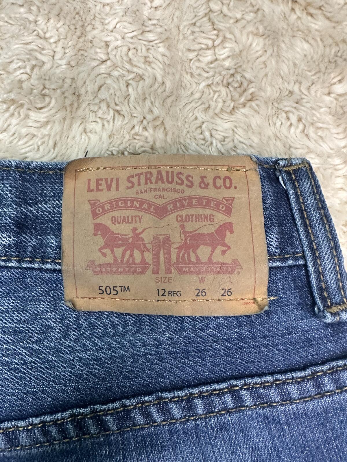 Levi's 505 Regular denim jeans Size 26x26/12 Reg medium wash straight leg unisex