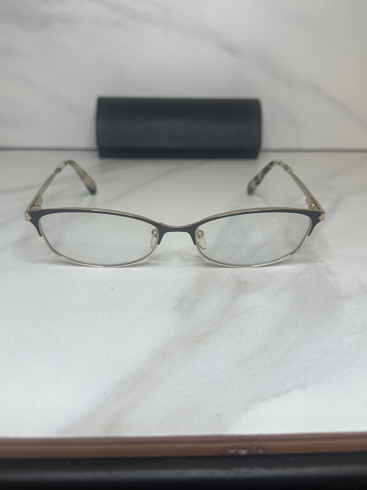 Prada VPR 03R gold tone cat-eye eyeglasses 55-16-135