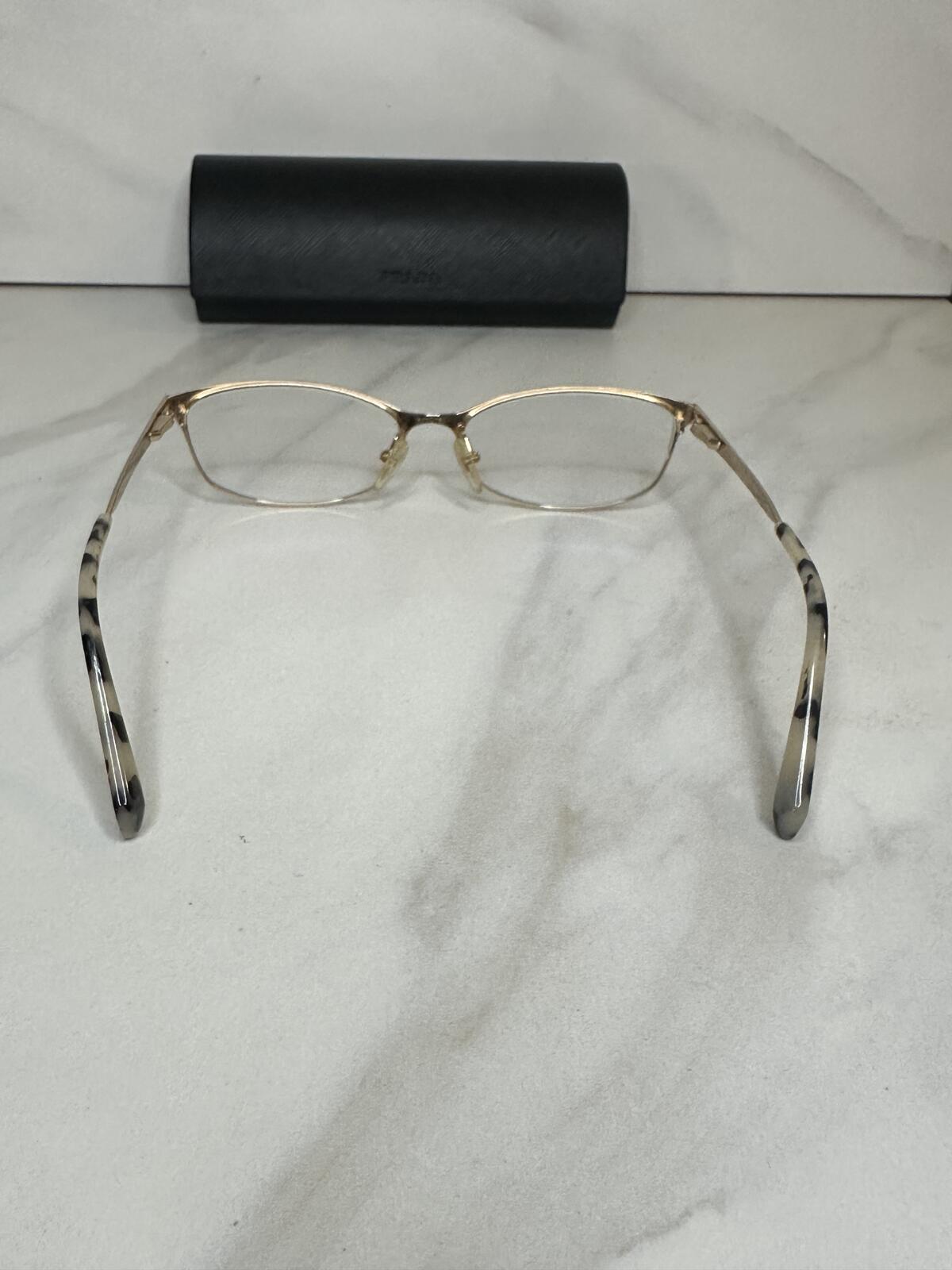 Prada VPR 03R gold tone cat-eye eyeglasses 55-16-135