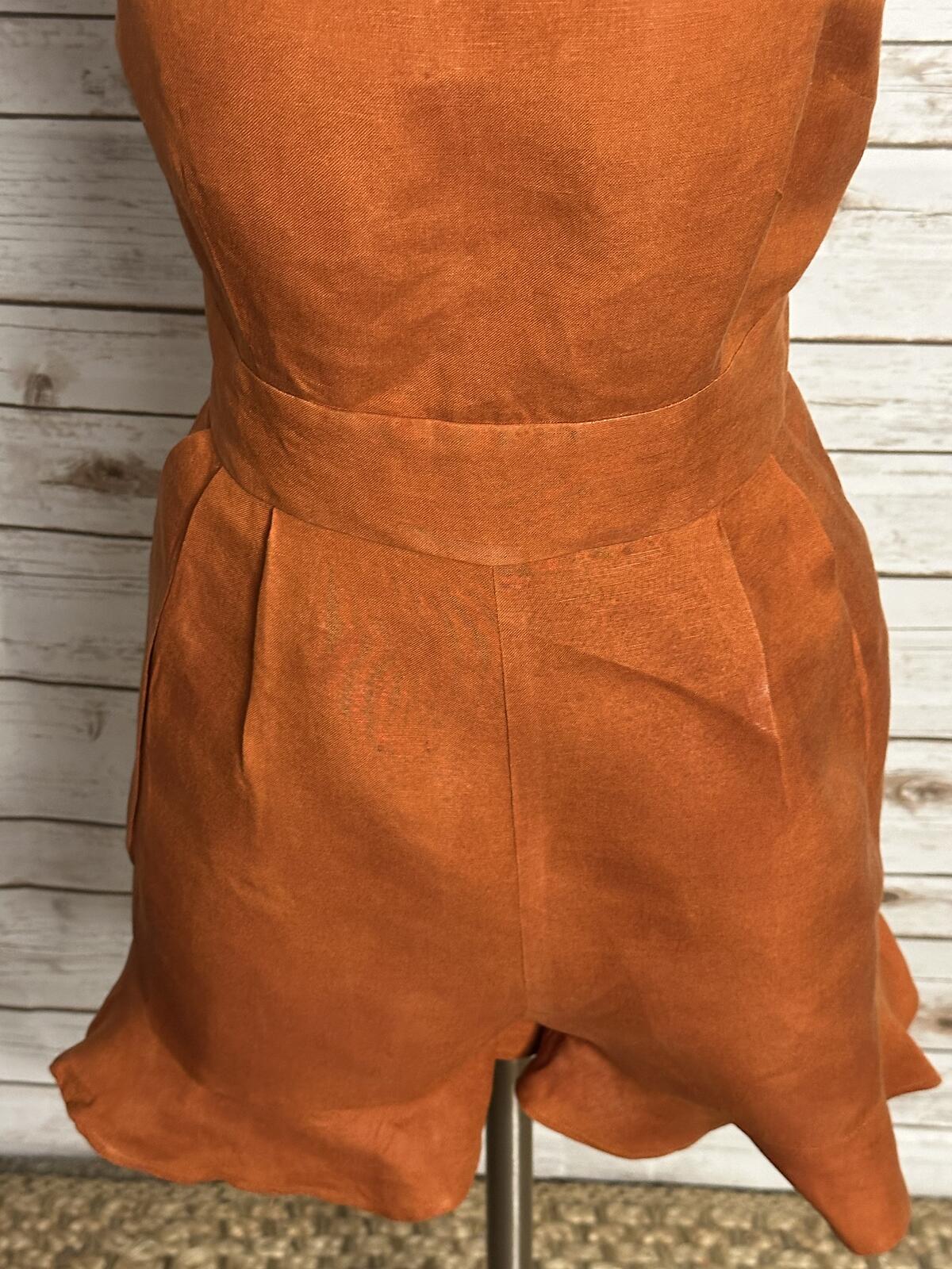 LOFT sleeveless ruffled hem romper Size 4 linen-blend rust coastal summer