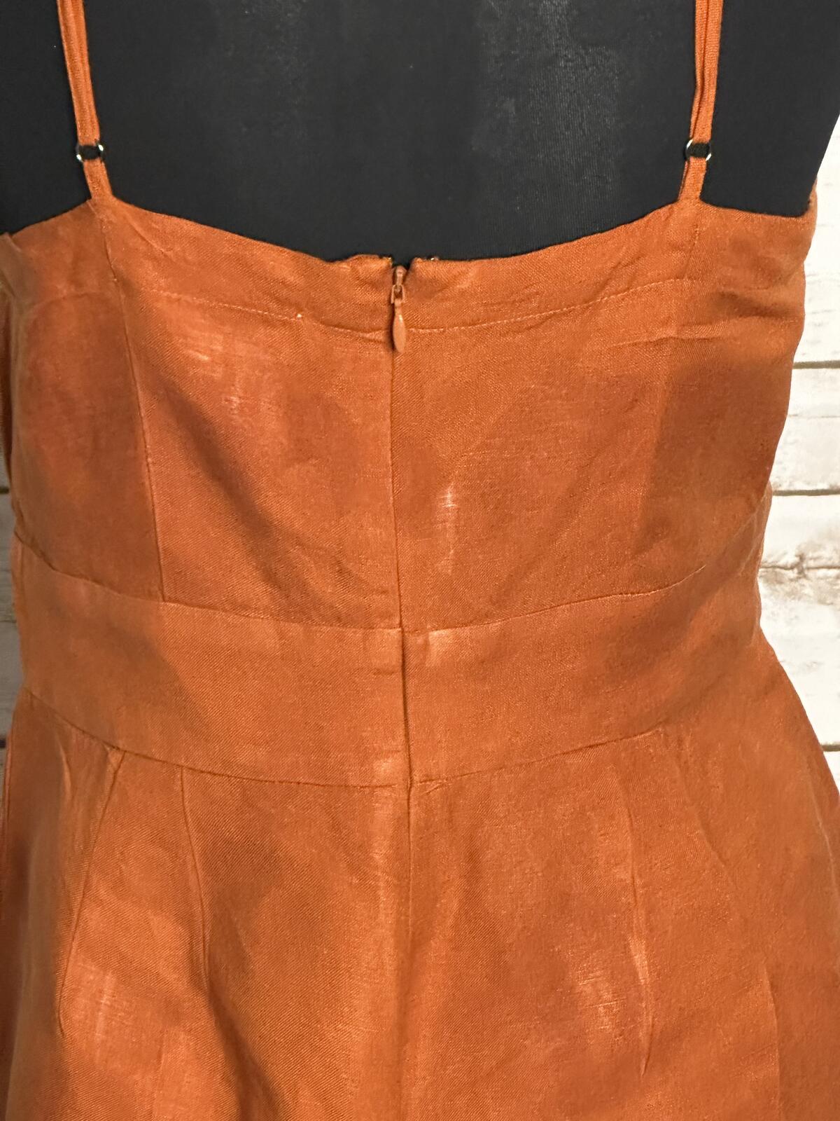 LOFT sleeveless ruffled hem romper Size 4 linen-blend rust coastal summer