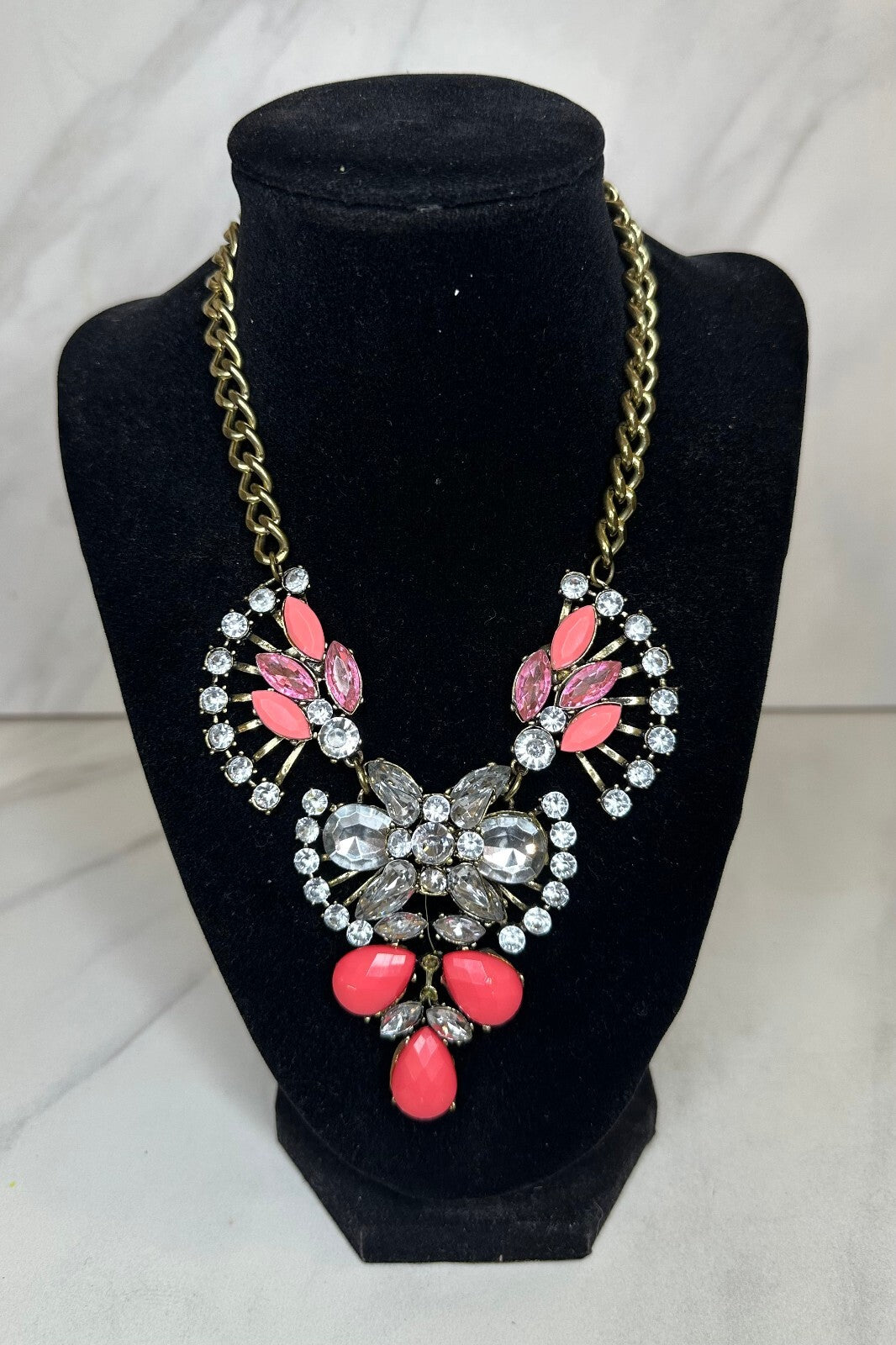 Coral and crystal rhinestone gold-tone bib necklace