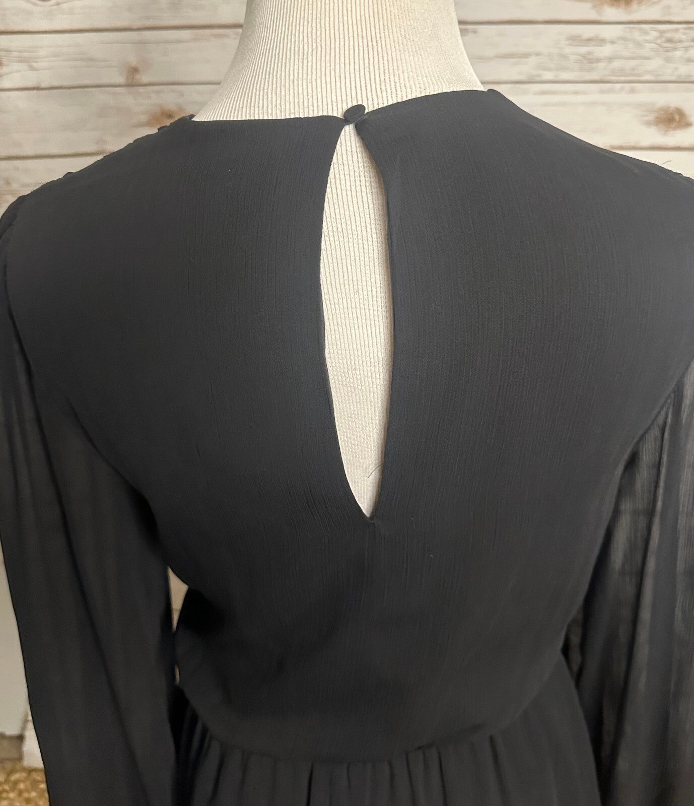 Express Conscious Edit black chiffon sheer long sleeve wrap-style romper Medium