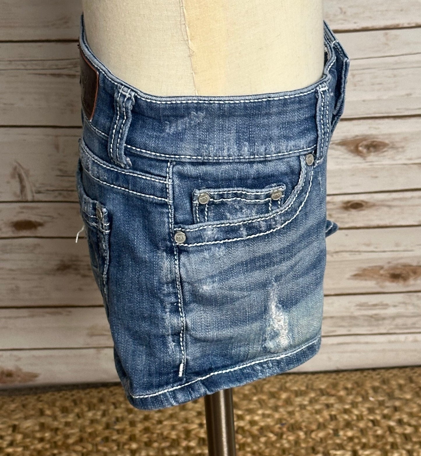 BKE Sabrina medium wash low-rise distressed stretch denim shorts Size 26 Y2K
