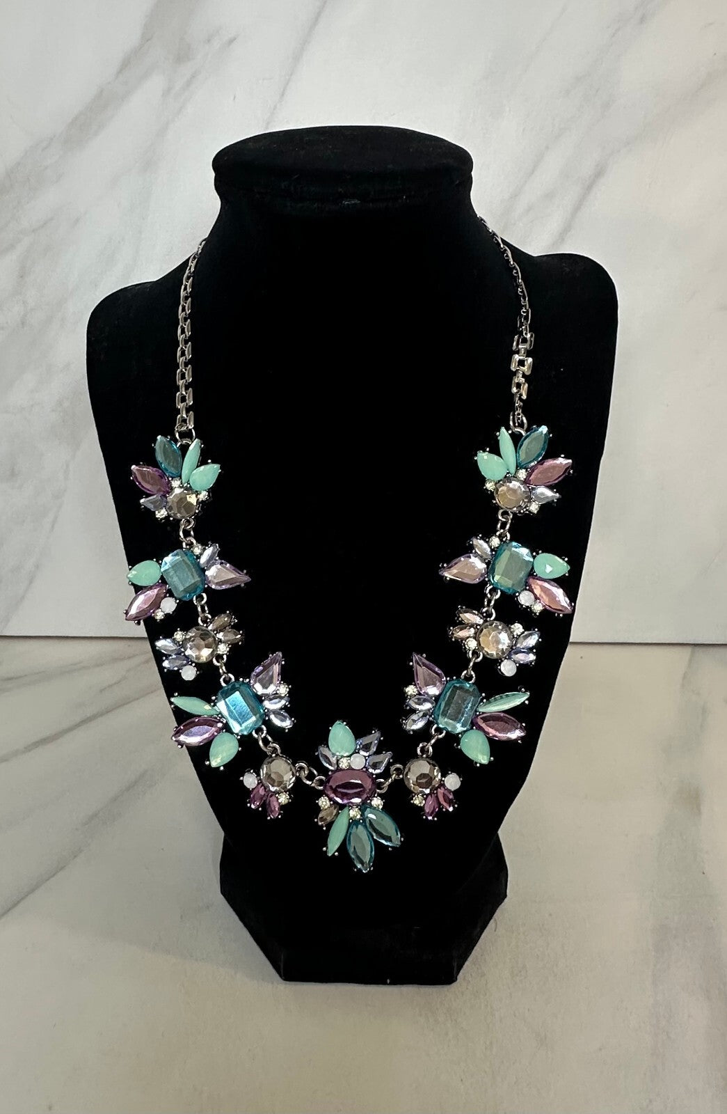 Pastel multicolored floral cluster silver tone adjustable statement bib necklace