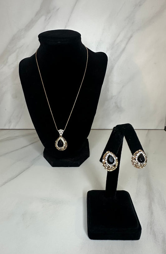 Matching gold-tone black and crystal teardrop earrings and pendant set