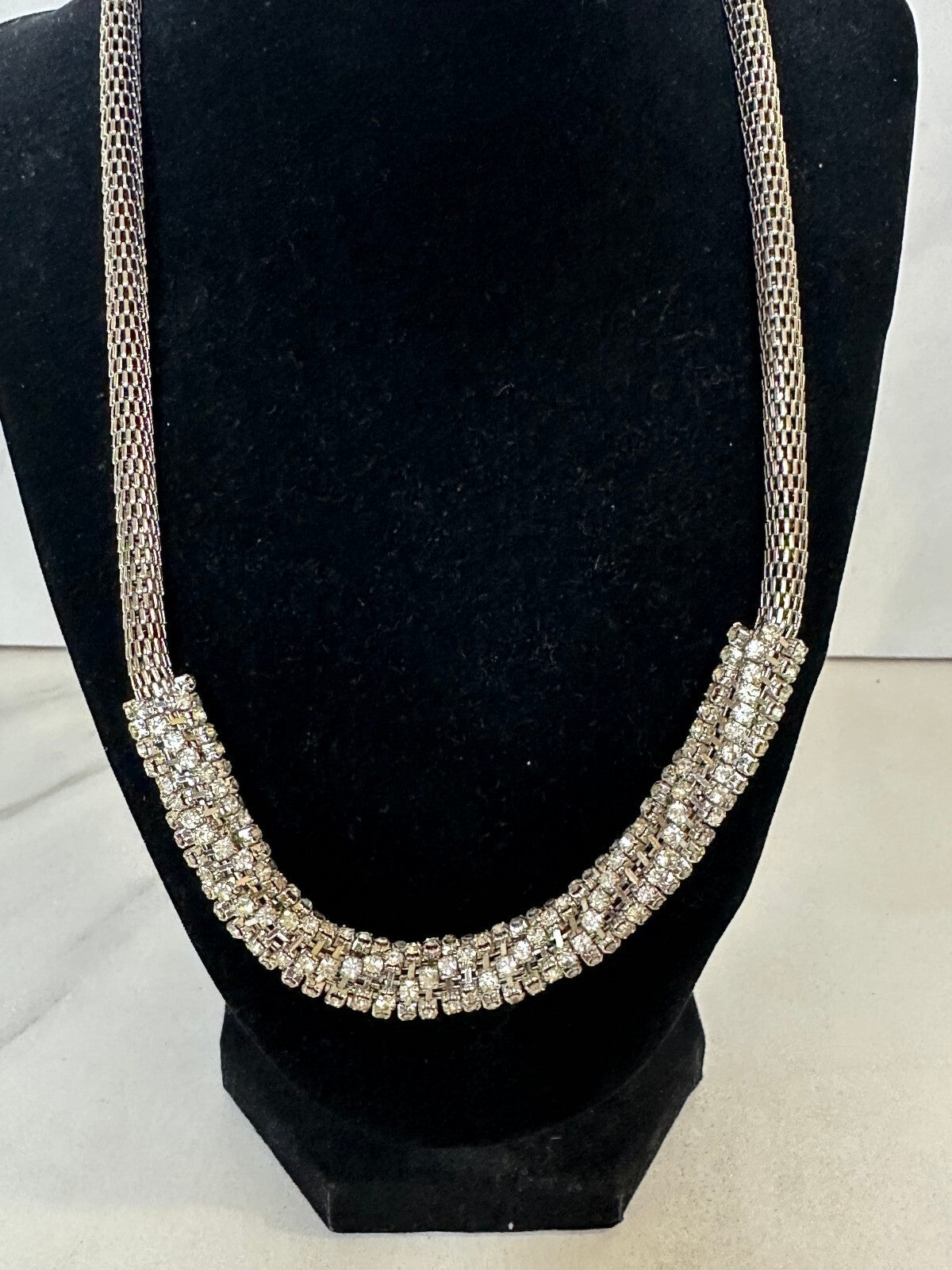 Pave multi-strand rhinestone silver tone mesh chain statement necklace