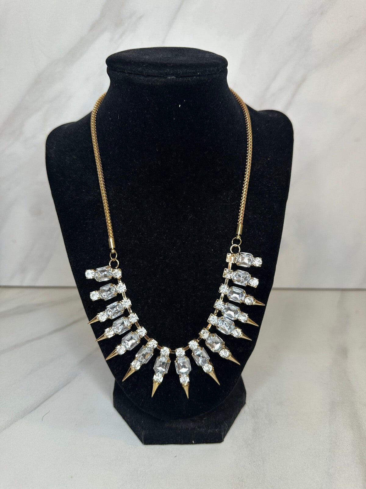 Crystal rhinestone gold tone spike statement bib necklace