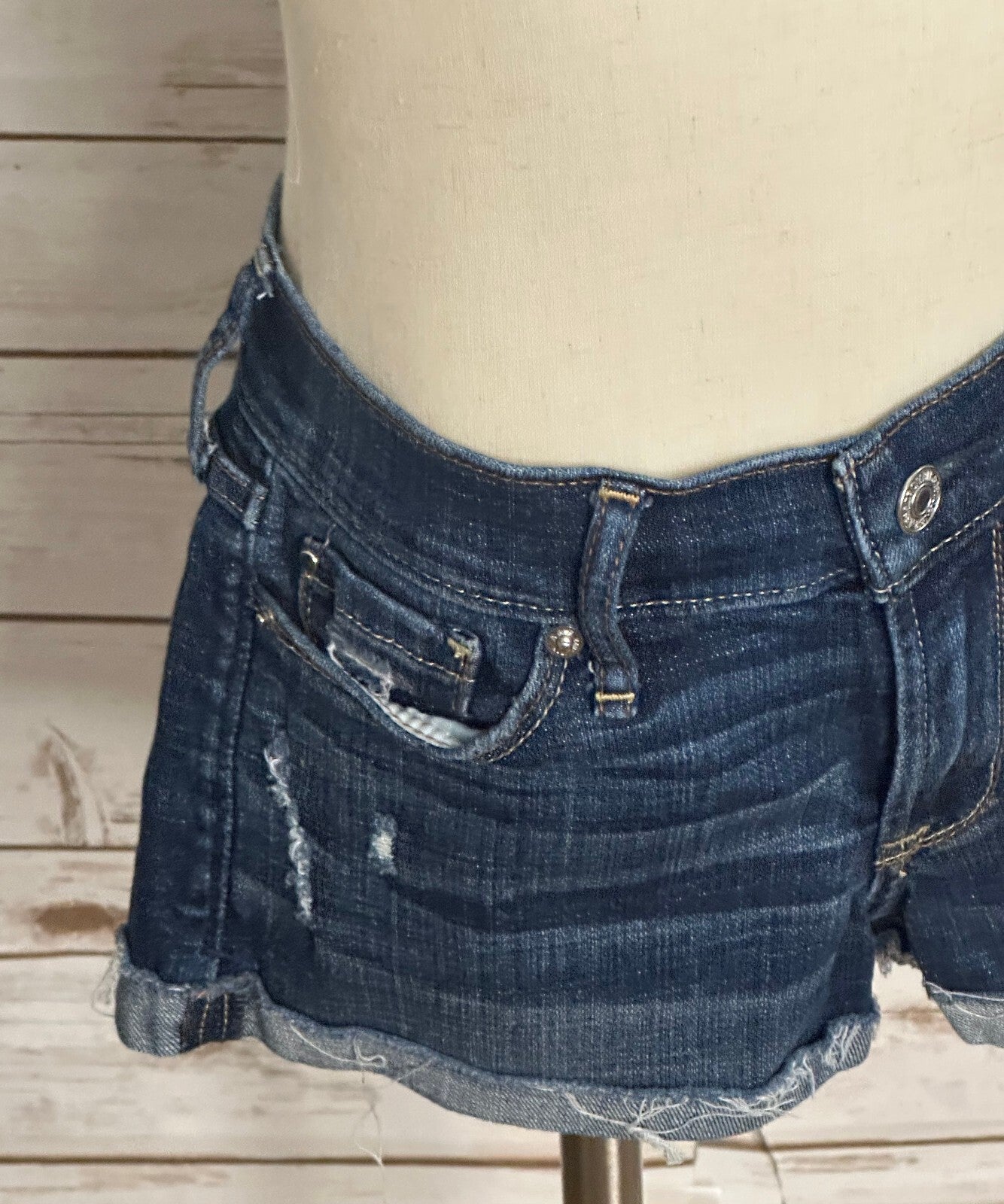 Abercrombie & Fitch medium wash distressed rolled cuff denim shorts Size 24