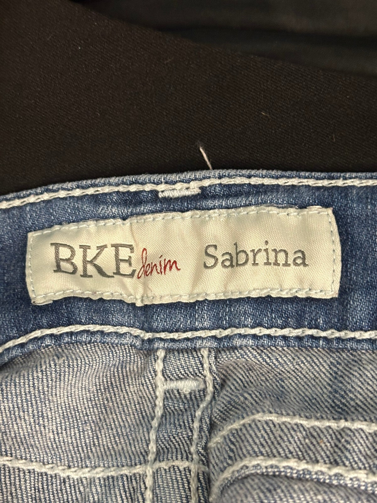 BKE Sabrina medium wash low-rise distressed stretch denim shorts Size 26 Y2K