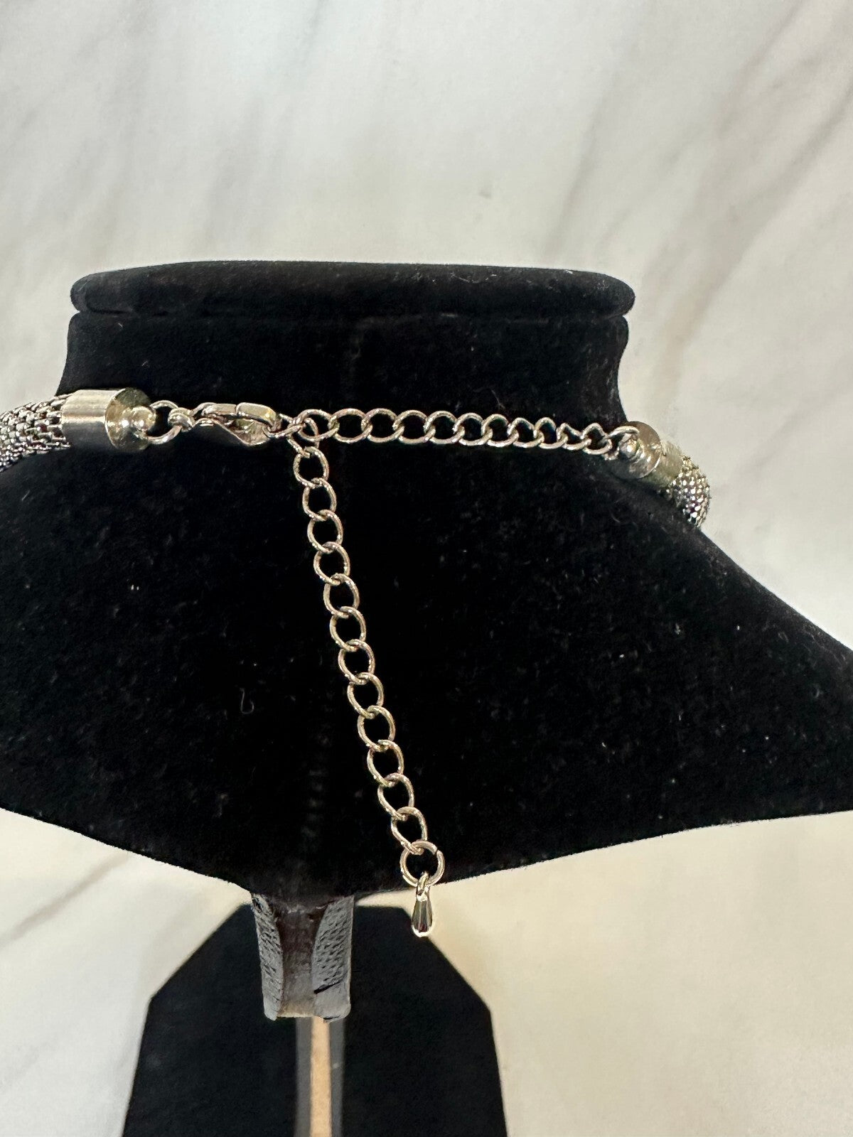 Pave multi-strand rhinestone silver tone mesh chain statement necklace