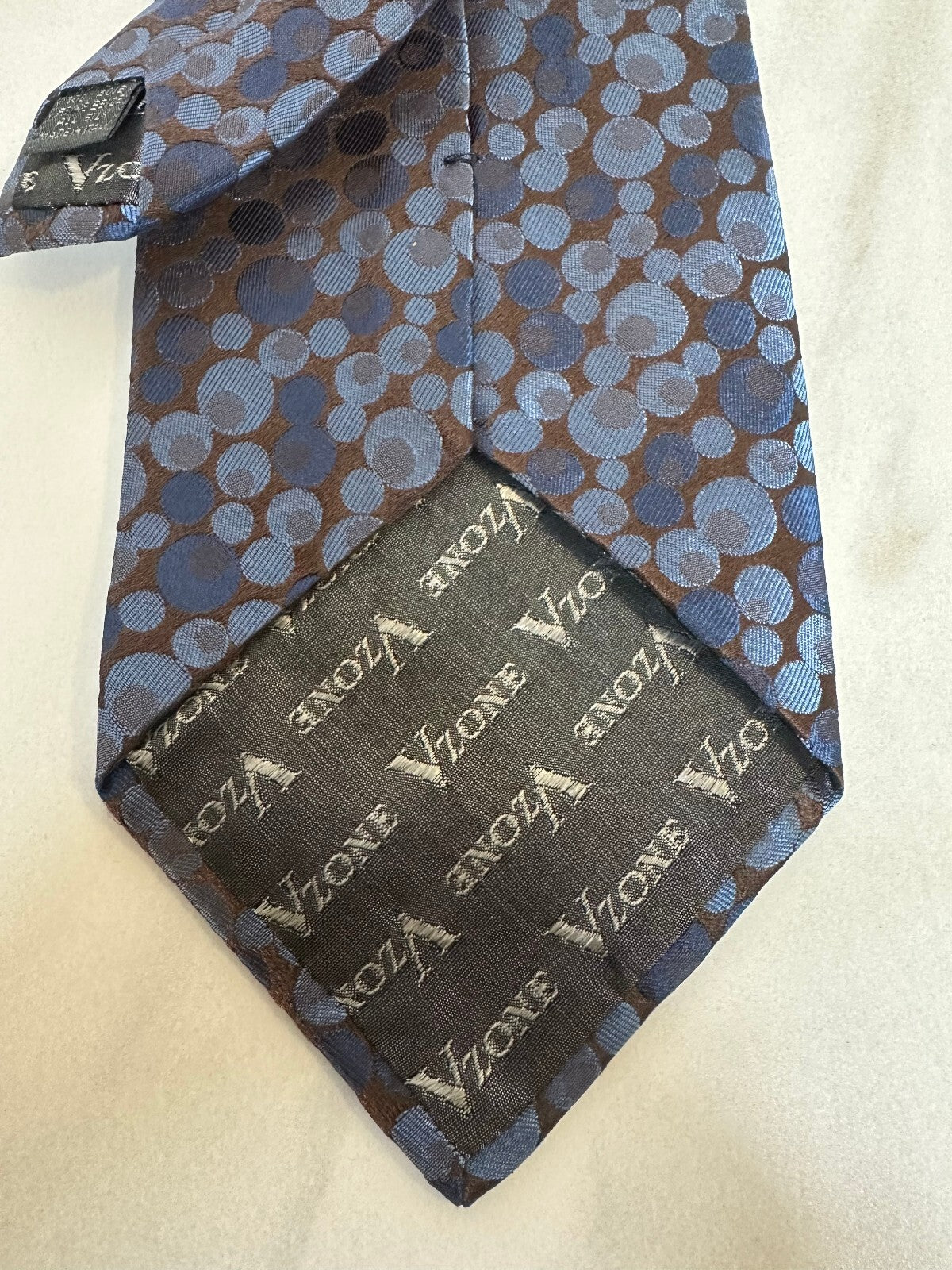 Vzone Valentino blue brown circular geometric 100% Italian silk tie quiet luxury